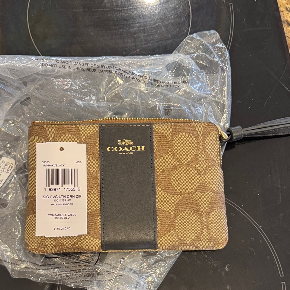 Coach Gold and Black Wristlet